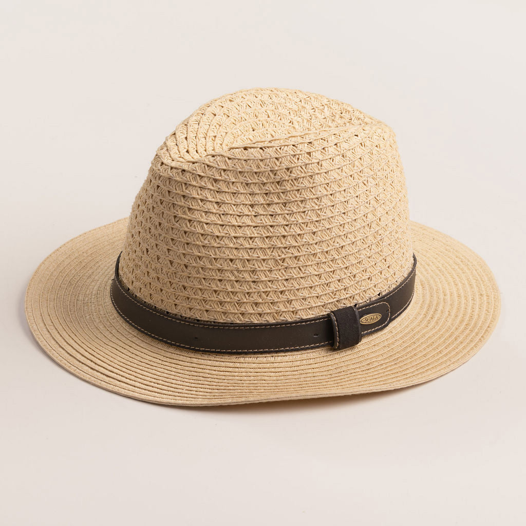Natural colored straw hat with a brown band on a light beieg background