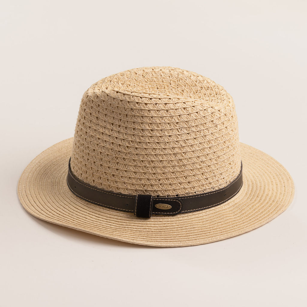 Natural colored straw hat with a brown band on a light beieg background