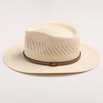 Natural colored straw hat with a brown band on a light gray background