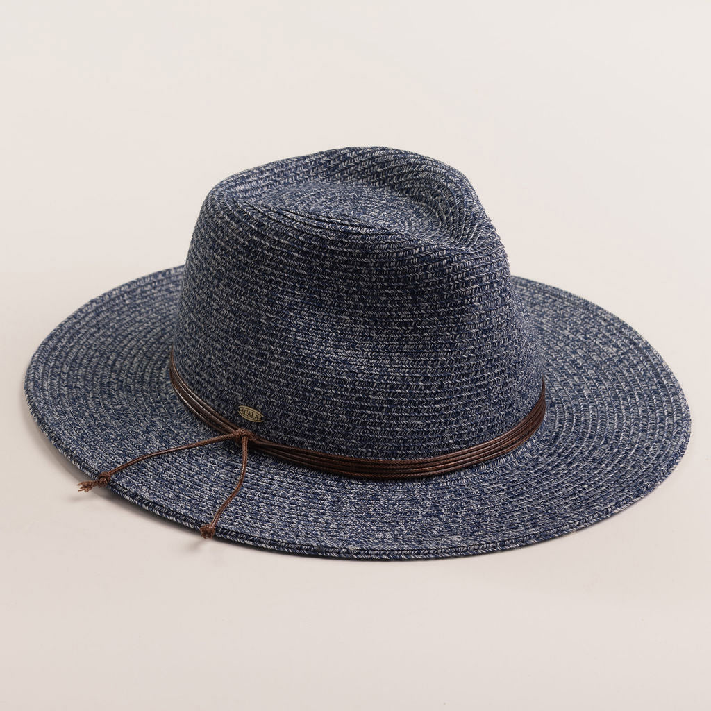 Denim colored straw hat with a brown band on a light beige background