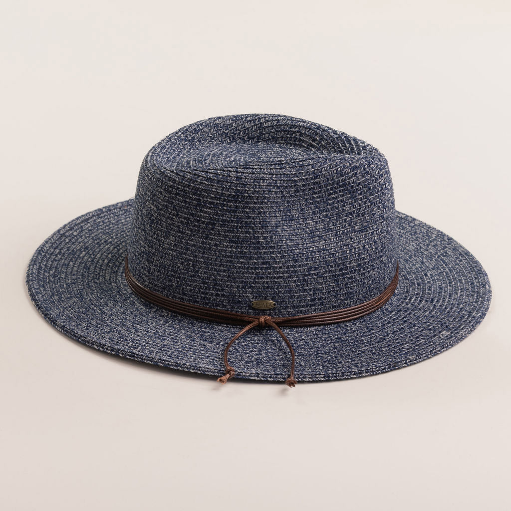 Denim colored straw hat with a brown band on a light beige background
